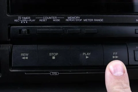 Press FF button on retro audio cassette tape recorder. Stock Photos
