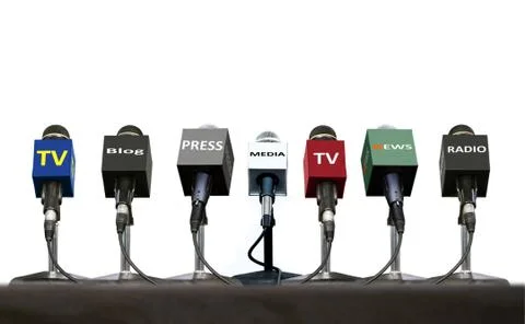 Press interview microphones on a table over white Stock Photos