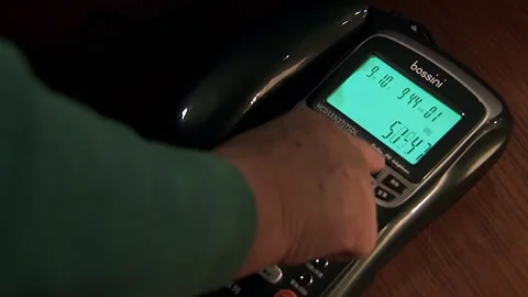 Press the landline phone button Stock Footage 252482136