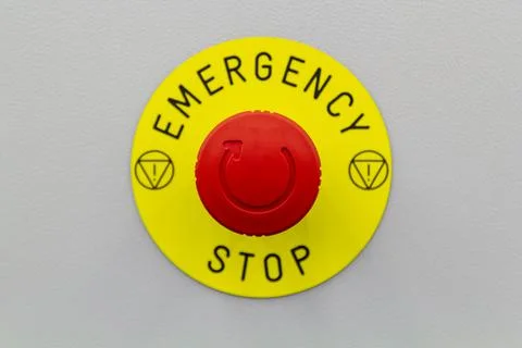 Press the machine red emergency stop button Stock Photos