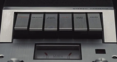 Press play button on retro audio cassette tape player recorder Stock Footage 121188311