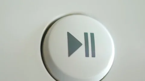 Press the play pause button on the device Stock Footage 119593508