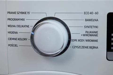 Press the switch to make the washing machine work. Home appliances. Laundry Stock Photos