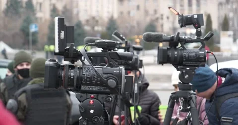 Press videographers with camcorders at protest rally of individual entrepreneurs Stock Footage 145712375