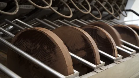 Pressed cocoa discs - Chocolate industry. Video stock 89538151