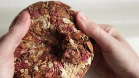 Pressed dry flowers herbal tea. Rose petals aromatherapy organic dry floral tea. Stock Footage 320052094