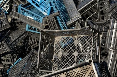 Pressed plastic crates boxes ready for recycling. Stock Photos