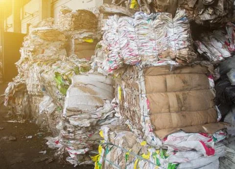 Pressed rubbish for further processing, sorting and processing of garbage, the Photos