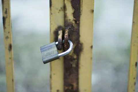 Pressed together locked gate Stock Photos