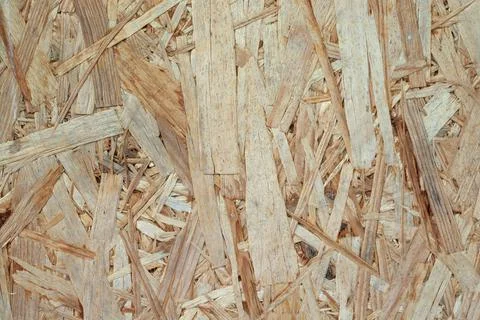 Pressed wood background with texture. Stock Photos