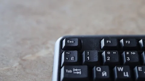 Presses The Corner Button Esc On PC Keyboard Stock Footage 124499879