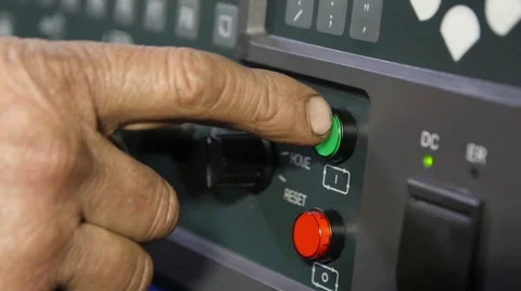 Presses the Green Button on the Machine Video stock 63863510