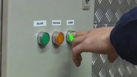 Pressing an Action Button on Heavy Industrial Machinery Видео 329959491