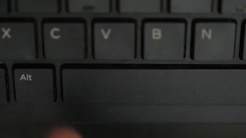 Pressing Alt On Black Computer Keyboard Video stock 150597586