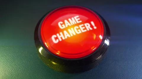 Pressing the big red button labeled with the message "Game Changer" Stock-Footage 293217633
