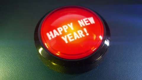 Pressing the big red button labeled with the message "Happy New Year" Video stock 293217734