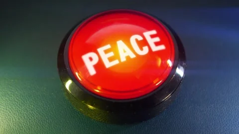 Pressing the big red button labeled with the message "Peace" Video stock 293217912