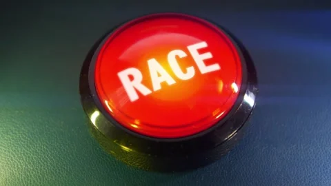 Pressing the big red button labeled with the message "Race" Stock Footage 293217929
