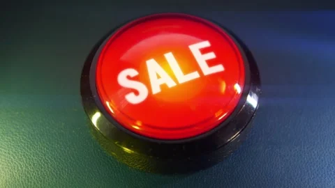 Pressing the big red button labeled with the message "Sale" Stock Footage 293217948
