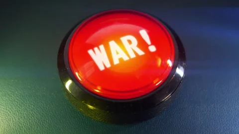 Pressing the big red button labeled with the message "War" Stock Footage 293218247