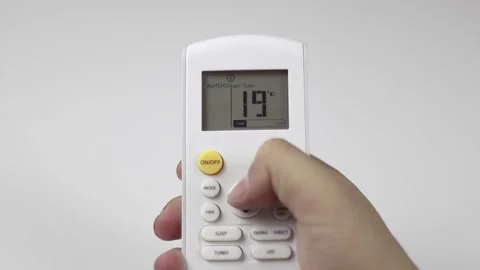 Pressing Button In The Air Conditioner Remote Control Stock Footage 233858859