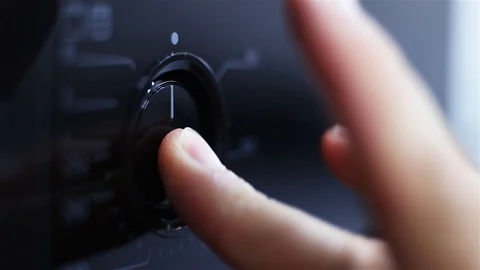 Pressing the button and adjusting the temperature of the modern oven, microwave Vidéo 93186722