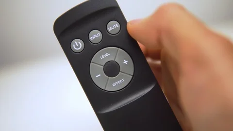 Pressing on-off button on hifi remote control Stock Footage 91986006