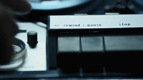 Pressing a button on an old recording device Stock Footage 274679445