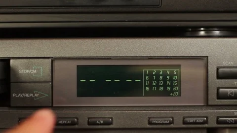 Pressing button open. Male finger presses cd player button. Stock Footage 112888871
