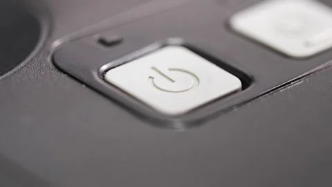 Pressing the button to start the printer at home office Stock Footage 333395769