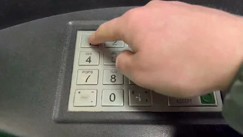 Pressing the buttons on the ATM Stock Footage 166066305