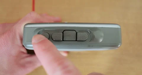 Pressing buttons on a cassette player, close-up, top view. Play button, stop Vídeos de archivo 266780922