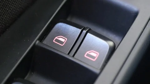 Pressing car electric window power button Stock Footage 88411136