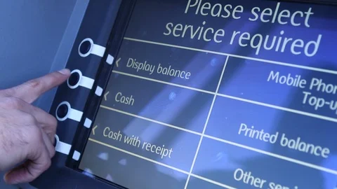 Pressing for cash at ATM Stock Footage 103328022
