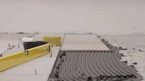 Pressing ceramic tile Stock Footage 111866118