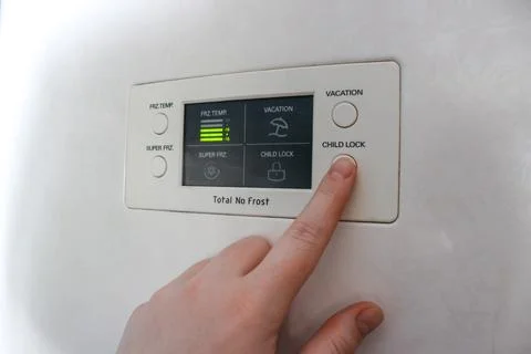 Pressing child lock button on the screen Foto stock