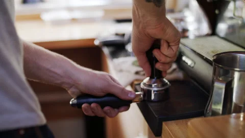 Pressing coffee grounds Stock Footage 138468738
