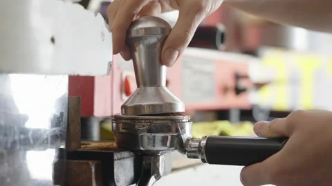 Pressing Coffee with Tamper Stock-Footage 194731422