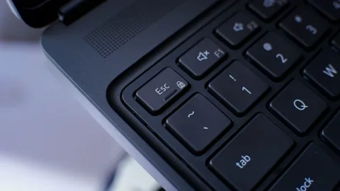 Pressing Computer Laptop Escape Key Multiple Times Stockbeeldmateriaal 154875382