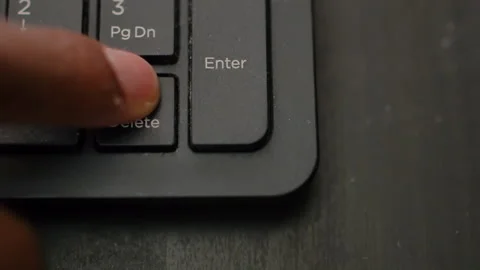 Pressing Delete On Black Computer Keyboard Stock-Footage 150598353