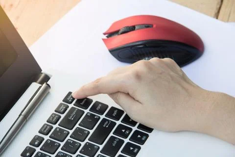 Pressing delete button on computer  keyboard Stock Photos