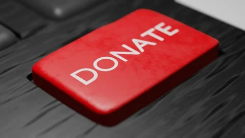 Pressing a Donate button on the keyboard. Donation. Social media network concept Video stock 179475609