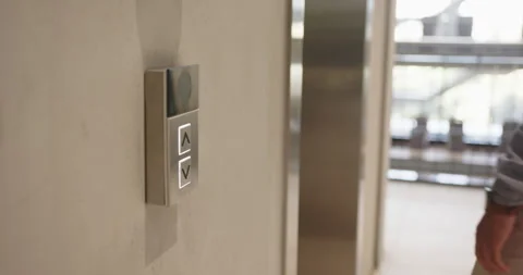 Pressing elevator button, business person waiting for elevator in office Video stock 297435468