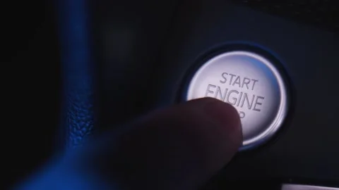 Pressing the engine start button in the car Stock Footage 222033519