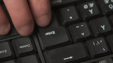 Pressing enter key close up macro shot Stock Footage 335482961