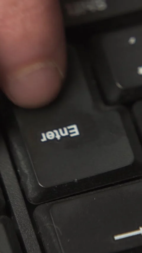 Pressing enter key close up macro shot Stock Footage 335915910