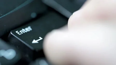 Pressing the enter key on a computer keyboard. Stock Footage