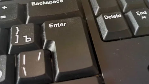 Pressing The Enter Key On A Computer Keyboard. Stock Footage 106936840