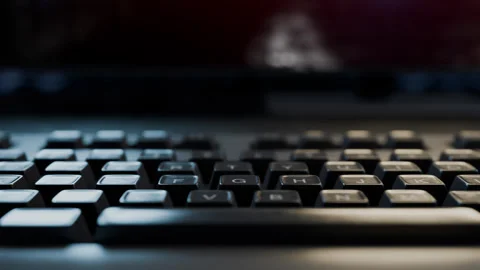 Pressing the enter key. Working on a computer. Hacking a computer. Hacker attack Stock Footage 323474835