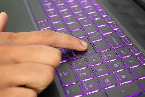 Pressing Enter on a Laptop Keyboard Foto stock